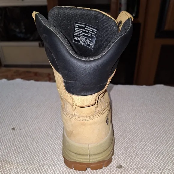 A pair of Herman Survivors leather boots in a men's size 11.5 Wide.