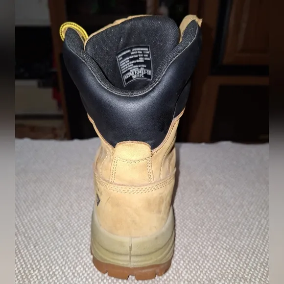 A pair of Herman Survivors leather boots in a men's size 11.5 Wide.