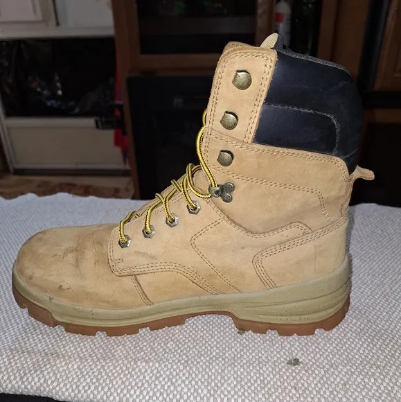 A pair of Herman Survivors leather boots in a men's size 11.5 Wide.