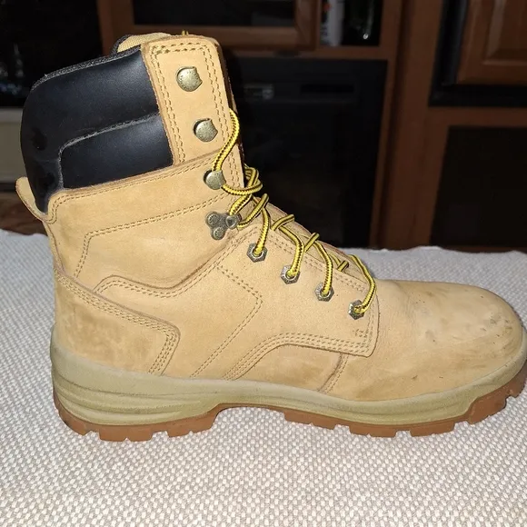 A pair of Herman Survivors leather boots in a men's size 11.5 Wide.