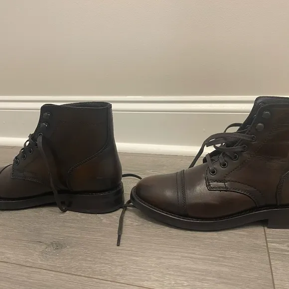 Black Coffee Heeled Boots with Cap Toe and Sleek Silhouette