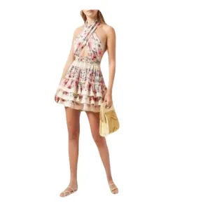 Breezy Beauty: Halter-Neck Mini Dress with Island Vibes.