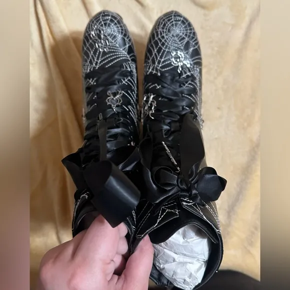 Dolls Kill Spiderweb platform heeled boots