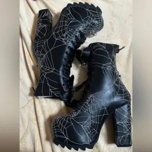 Dolls Kill Spiderweb platform heeled boots