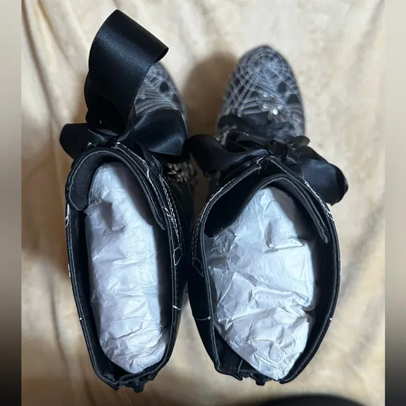 Dolls Kill Spiderweb platform heeled boots