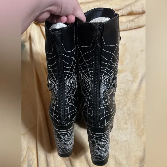 Dolls Kill Spiderweb platform heeled boots