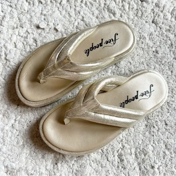 free people: Metallic Gold Leather Wonderland Flip Flop Sandals Size 37