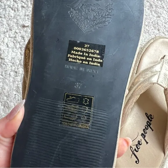 free people: Metallic Gold Leather Wonderland Flip Flop Sandals Size 37
