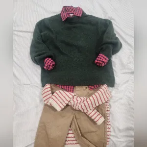 Green Sweater with Red Plaid Shirt and Tan Pants