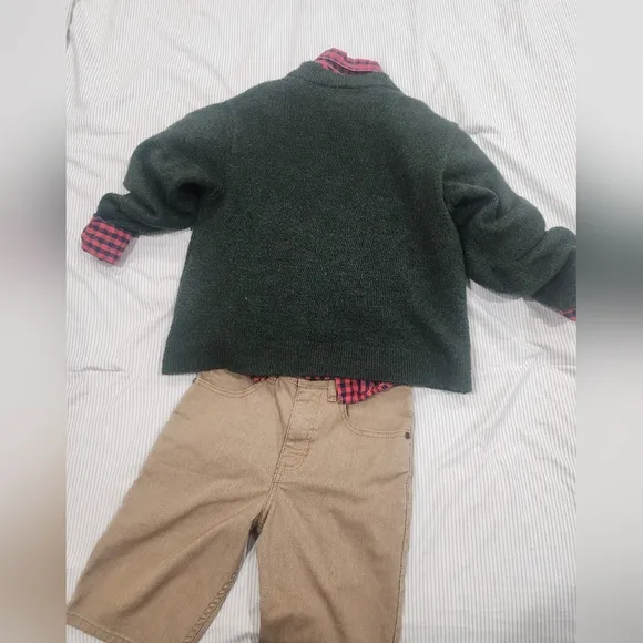 Green Sweater with Red Plaid Shirt and Tan Pants