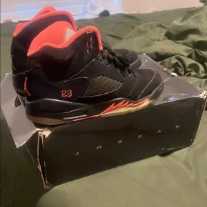 Jordan Black and Red Sneakers with Iconic Design