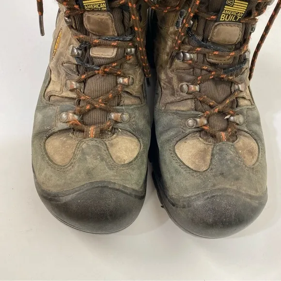 Keen brown high top work boots outdoor construction worker