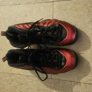 Nike Red and Black Sneakers with Sleek Design