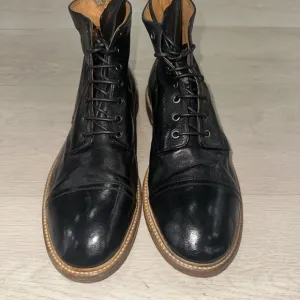 Officine Creative Black and Brown Boots with Lace-Up Design