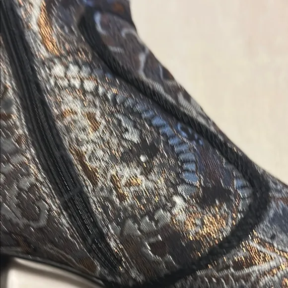Stuart Weitzman Black and Silver Heeled Boots with Vintage Charm