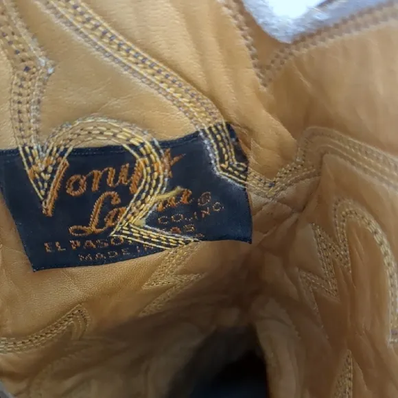 Tony Lama Brown Leather Cowboy Boots with Intricate Stitching