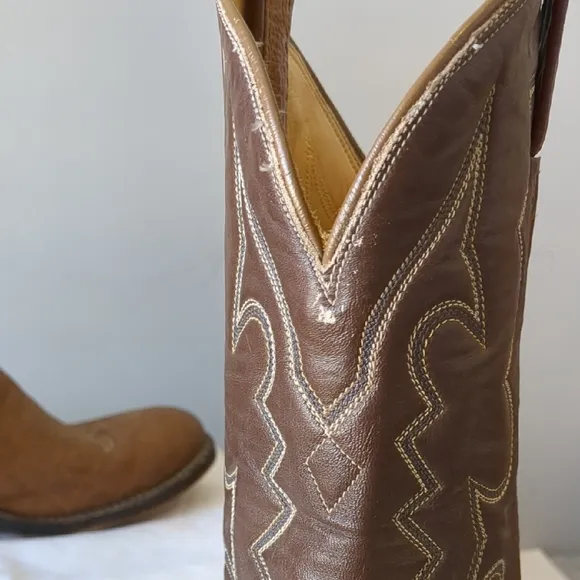 Tony Lama Brown Leather Cowboy Boots with Intricate Stitching
