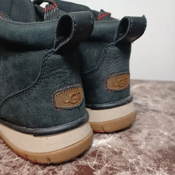 UGG Black Boots with High-Top Design and Rugged Durability