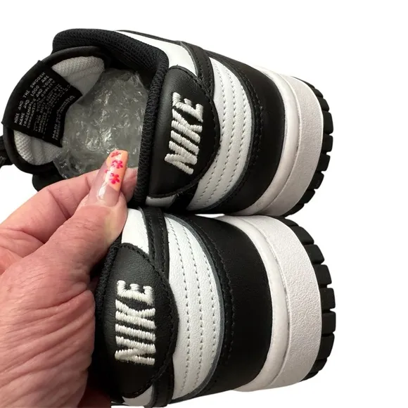 Women’s Nike Dunk Low Black and White Sneakers