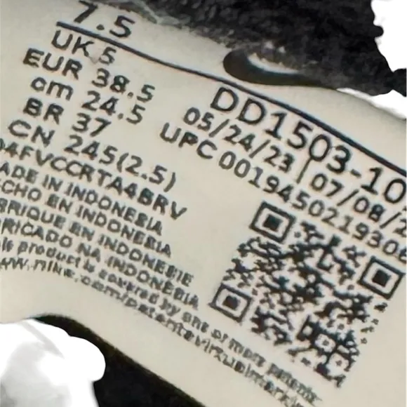 Women’s Nike Dunk Low Black and White Sneakers