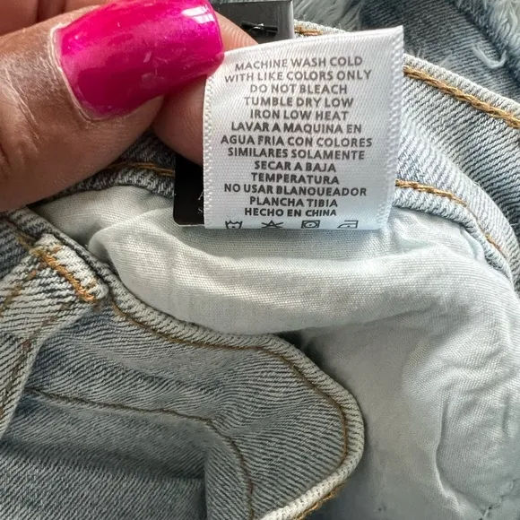 Work it Ms. thang in your booty-licious distressed ruffled denim shorts
