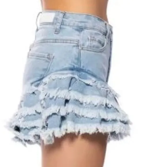 Work it Ms. thang in your booty-licious distressed ruffled denim shorts